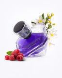 Cleo Beauty luxury women's fragrance in a crystal bottle with raspberry and flower accents